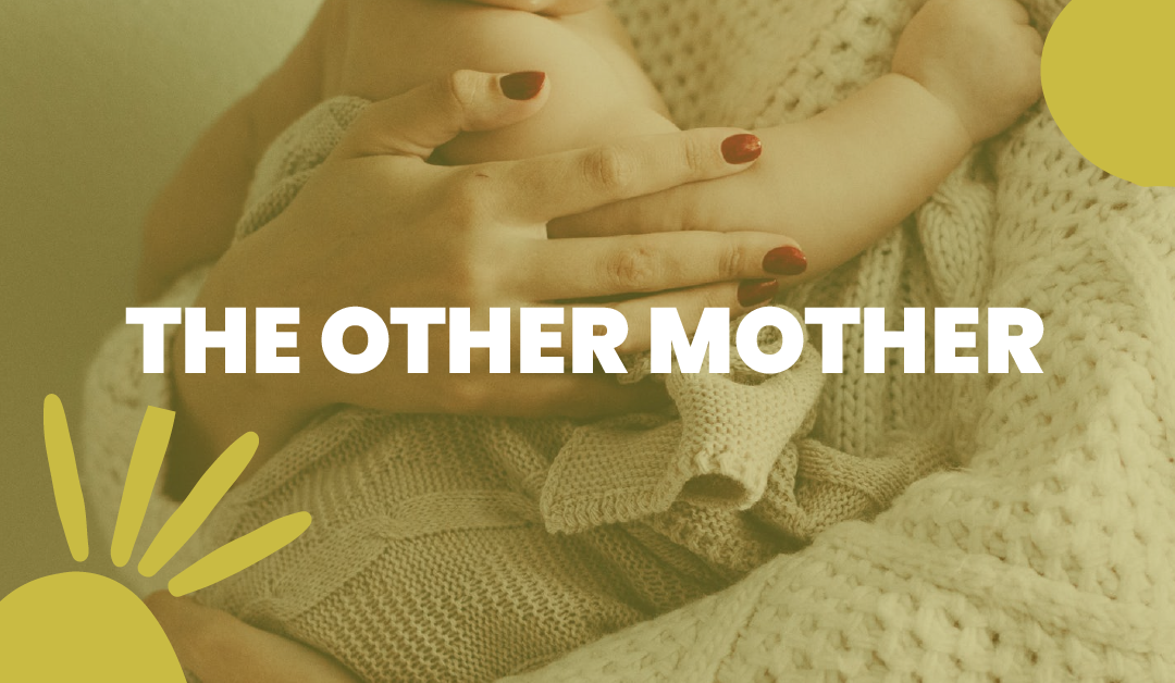Woman holding baby representing the other mother for a new episode on the We're Gonna Talk About it Podcast